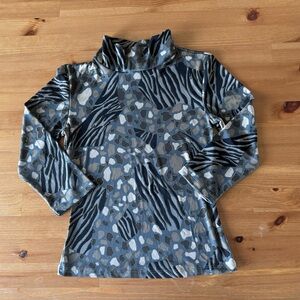 Y2K turtleneck with a zebra pattern